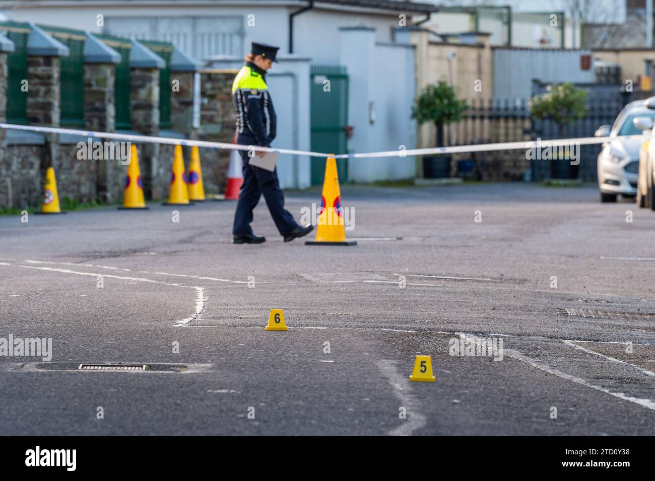 Member of An Garda Siochána guarding a crime scene in Ireland. Stock Photo