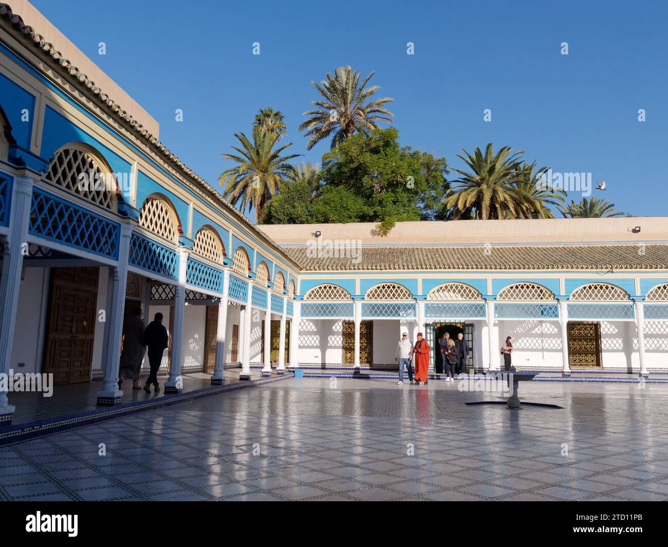 Courtyard with fountain and wooden verandas in the Bahia Palace in the city of Marrakesh aka Marrakech, Morocco. December 15, 2023 Stock Photo