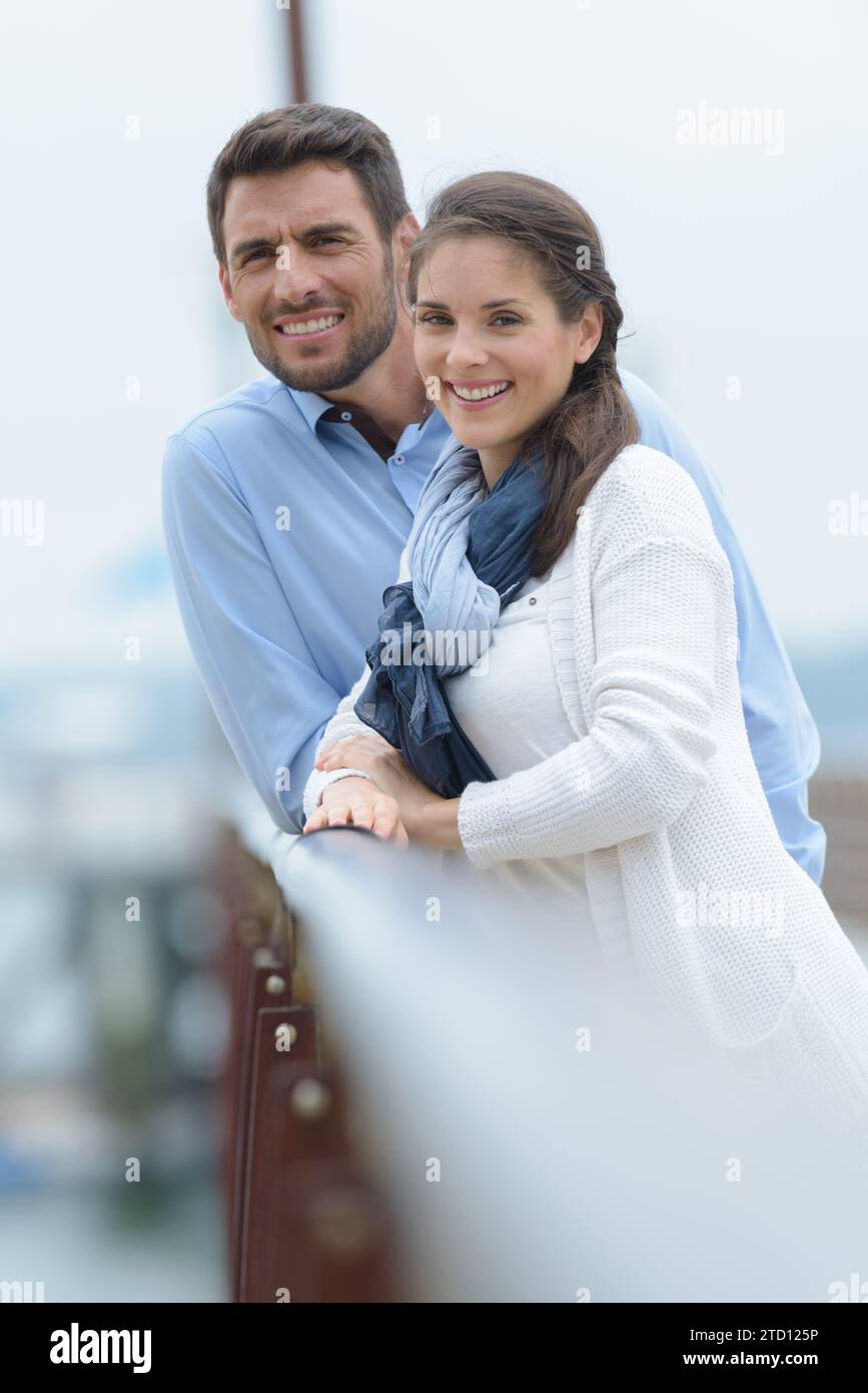 focused picture of man and woman on a bridge Stock Photo - Alamy