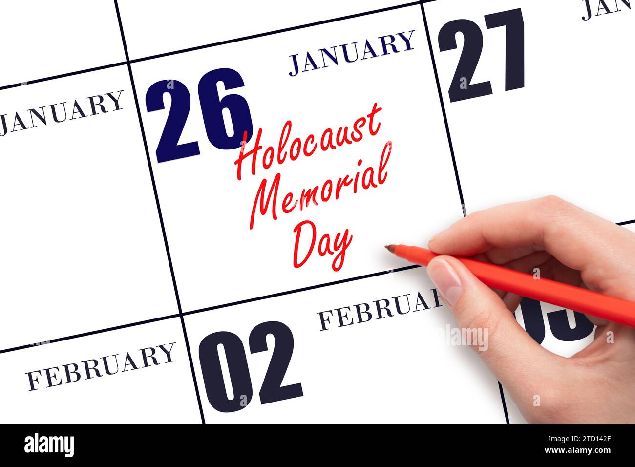 January 26. Hand writing text Holocaust Memorial Day on calendar date. Save the date. Holiday.  Day of the year concept. Stock Photo