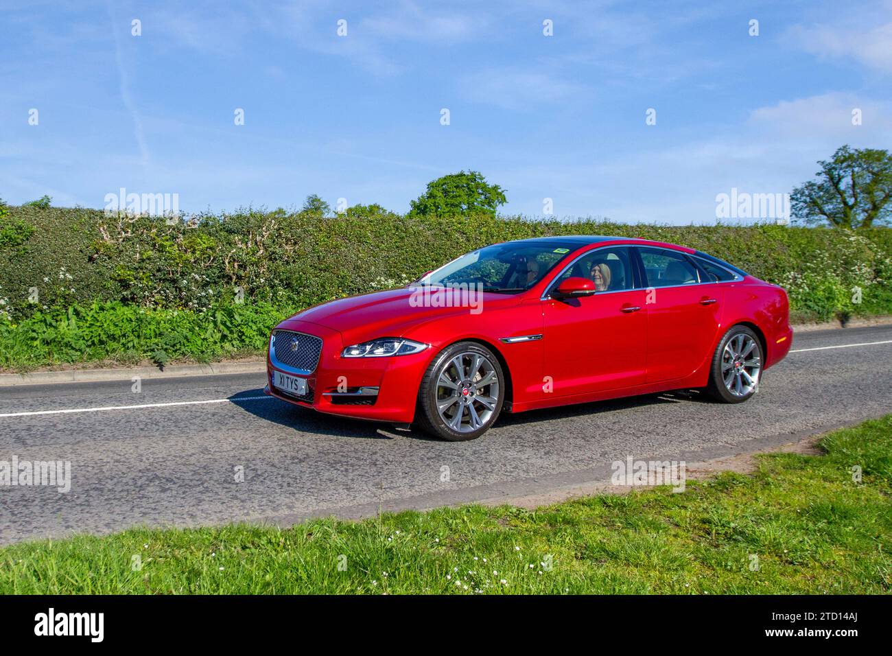 2016 Red British Jaguar XJ D V6 PORTFOLIO 2993 cc Diesel 8 speed automatic, Stock Photo