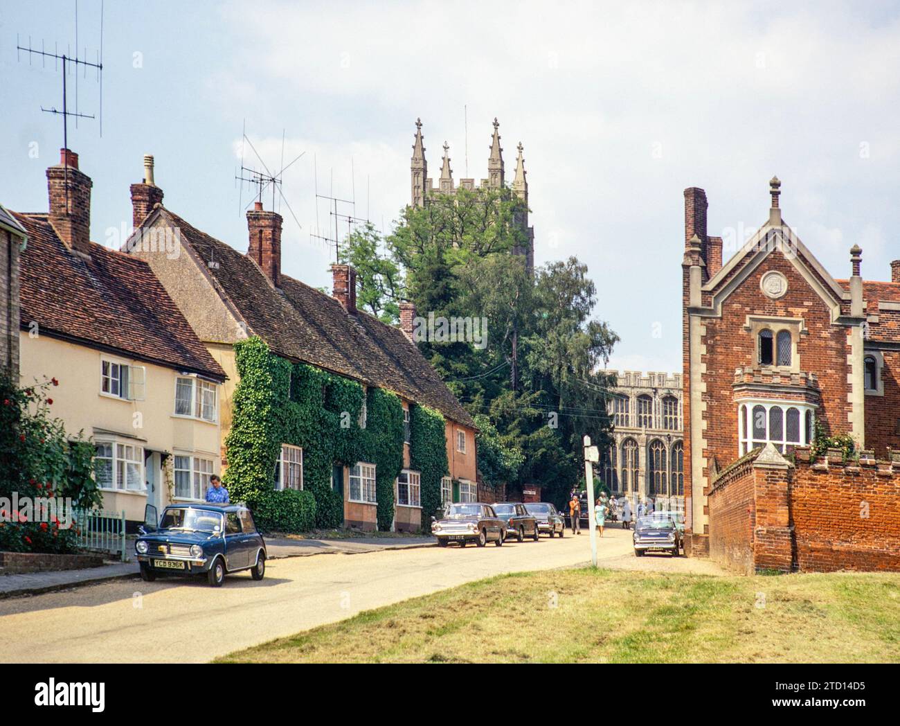 Historic buildings and church, Long Melford, Suffolk, England, UK July 1972 Stock Photo