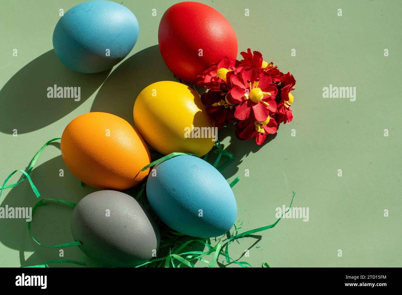 colorful eggs symbolize easter. Easter minimal concept. Creative Happy Easter, spring layout. Stock Photo