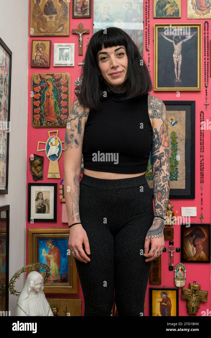 A tattoo business owner in their tattoo shop in Edinburgh Scotland