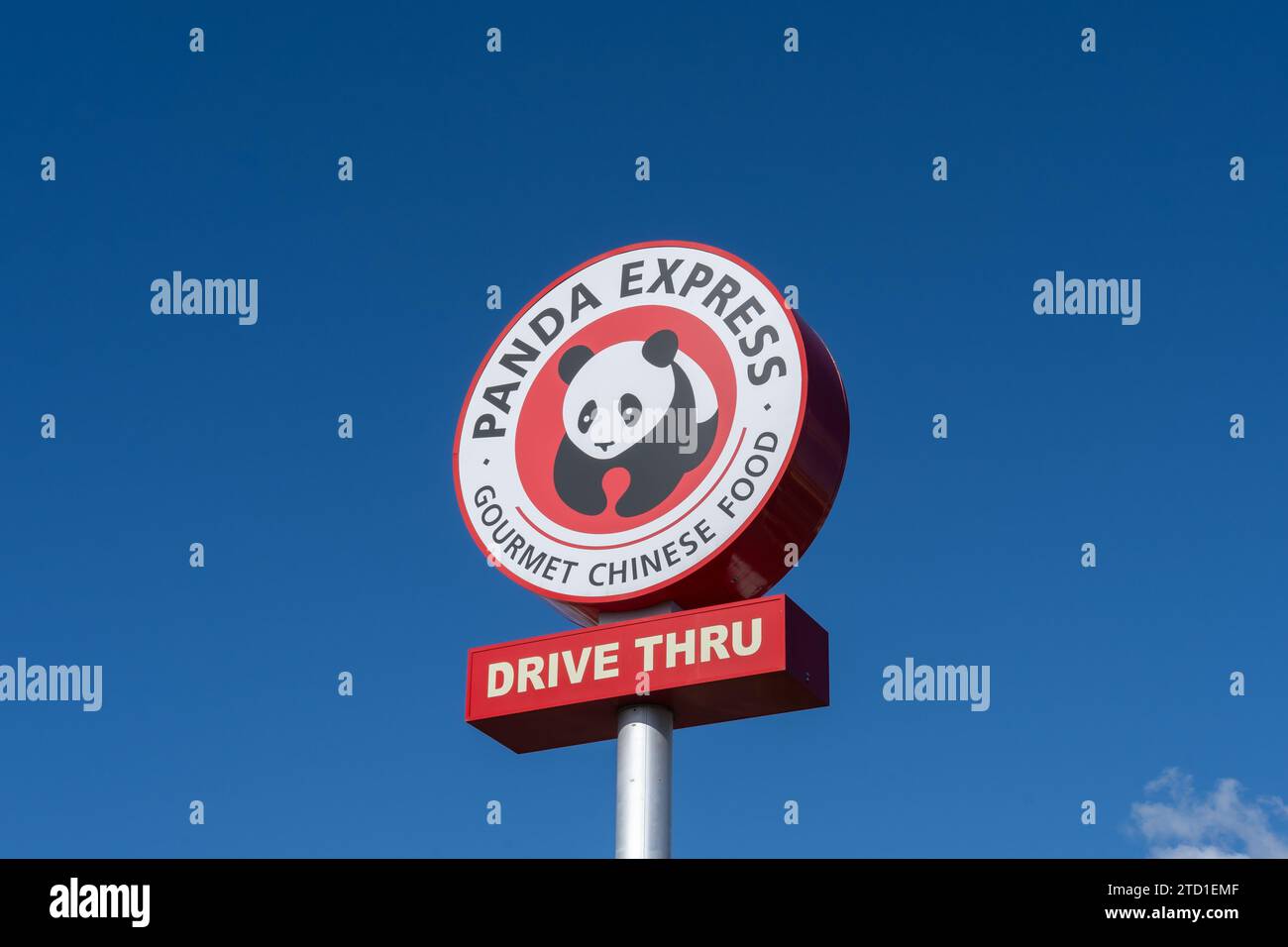 Close up of the Panda Express pole sign with the blue sky in the background. Ontario, Oregon, United States Stock Photo