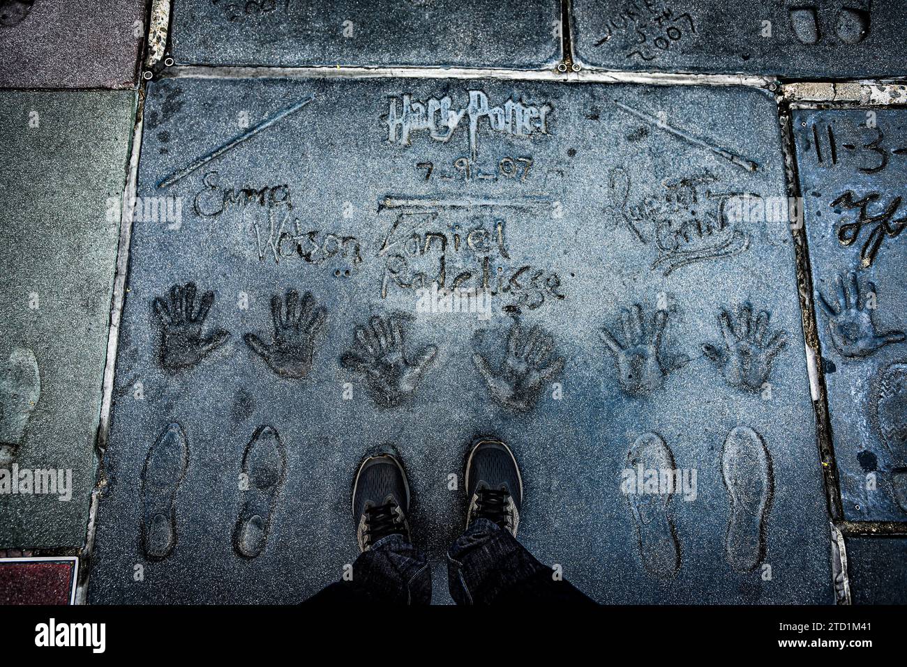 Standing by Harry Potter Cast Handprints in the Forecourt of Grauman's Chinese Theatre - Los Angeles, California Stock Photo