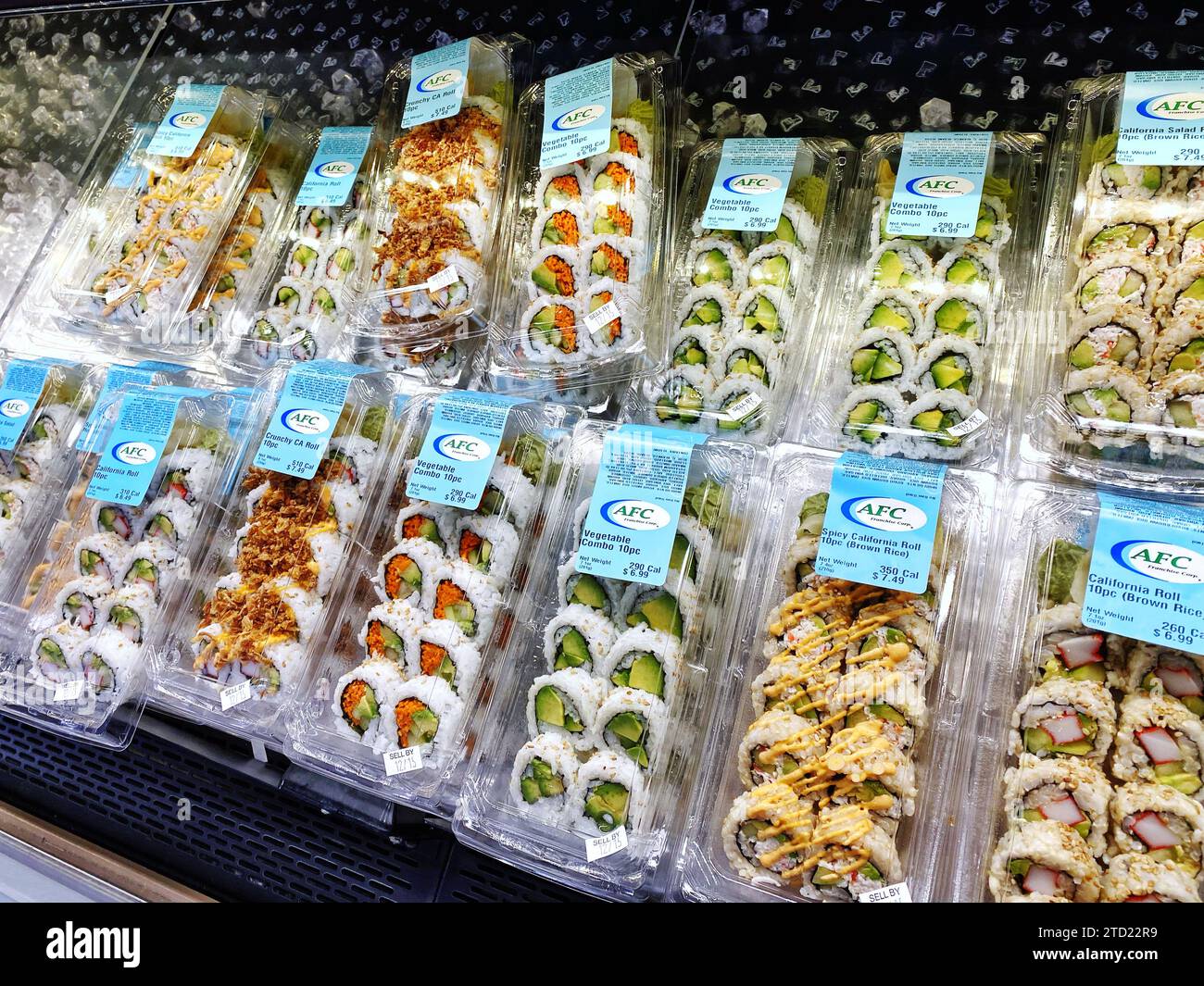 Premade prepared sushi for sale at a supermarket cooler in California, United States Stock Photo