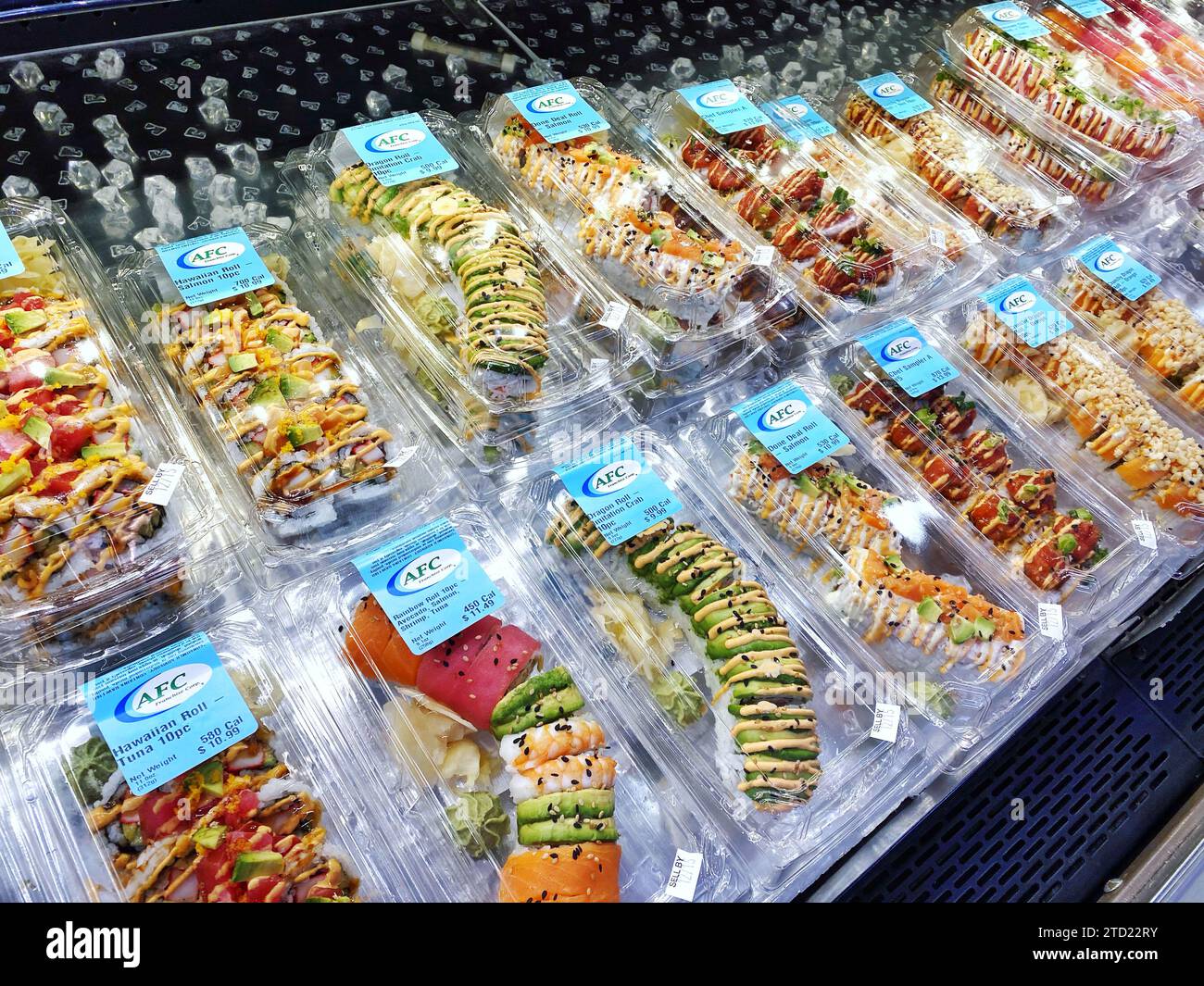 Premade prepared sushi for sale at a supermarket cooler in California, United States Stock Photo