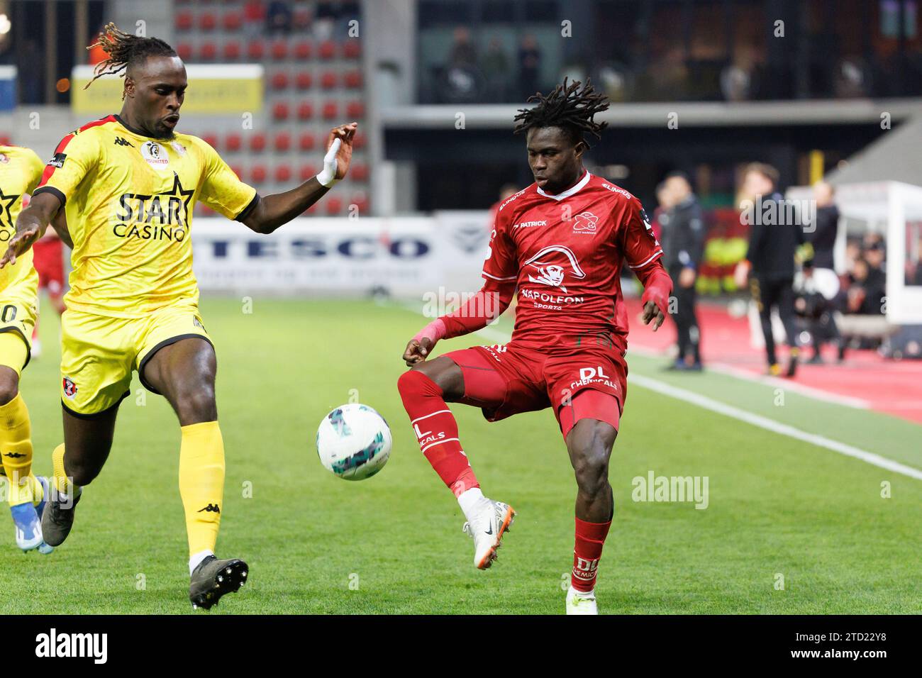 Seraing's Marvin Silver Tshibuabua and Essevee's Abdoulaye (Ablo) Traore fight for the ball during a soccer match between SV Zulte Waregem and RFC Seraing, Friday 15 December 2023 in Waregem, on day 16/30 of the 2023-2024 'Challenger Pro League' second division of the Belgian championship. BELGA PHOTO KURT DESPLENTER Stock Photo