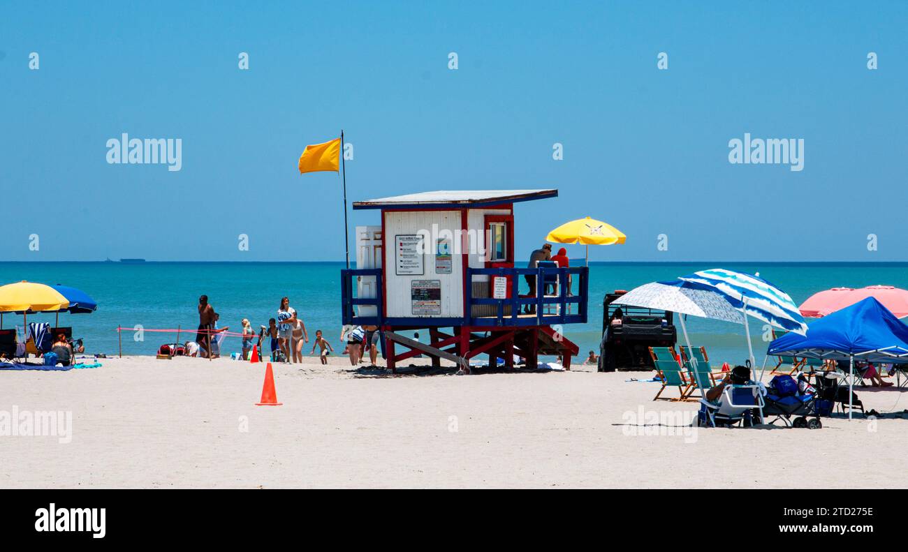 Cocoa Beach, Florida, USA 27 June 2023 A red, blue and white lifeguard stand on the beach