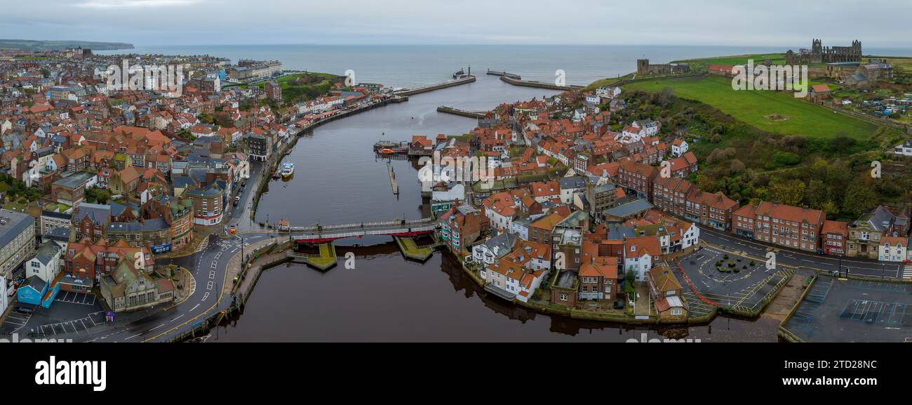 Whitby, North Yorkshire. Aerial View of the town and harbour featuring Whitby Abbey. Stock Photo