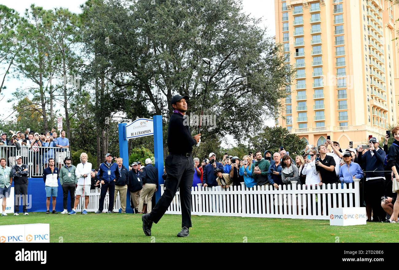 Tiger Woods hits a tee shot on the first hole of the ProAm at the PNC