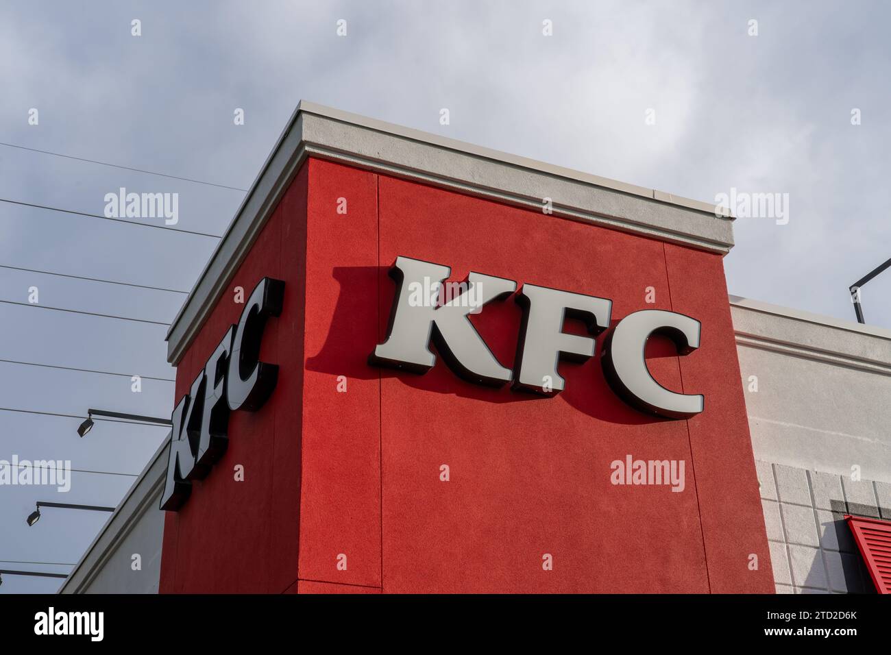 Close up of KFC logo on the building at its World's First KFC (Kentucky Fried Chicken) restaurant in Salt Lake City, Utah, USA. Stock Photo