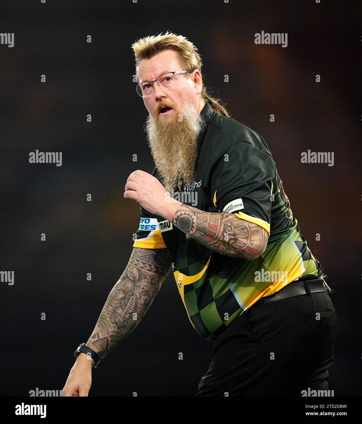 Simon Whitlock celebrates against Paolo Nebrida (not pictured) on day