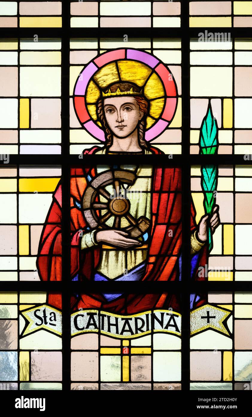 St Catherine of Alexandria. A stained-glass window in Église Saint-Laurent (St Lawrence's Church), Strassen, Luxembourg. Stock Photo