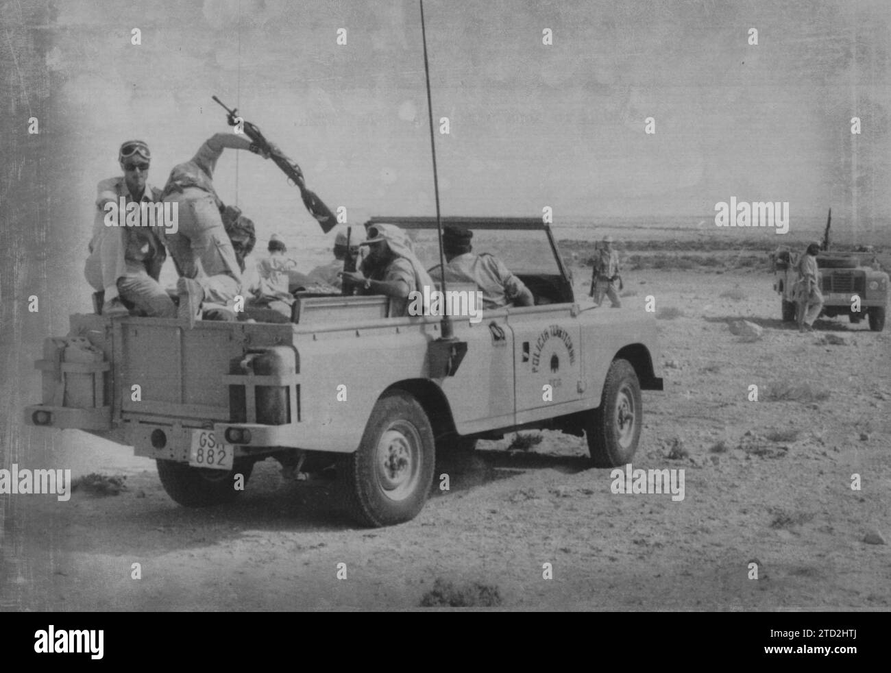 Tarfaya (El Aaiún), 11/05/1975. Members of the Territorial Police of the Spanish Army tour the border defensive zone in a Land Rover Defender. Credit: Album / Archivo ABC Stock Photo