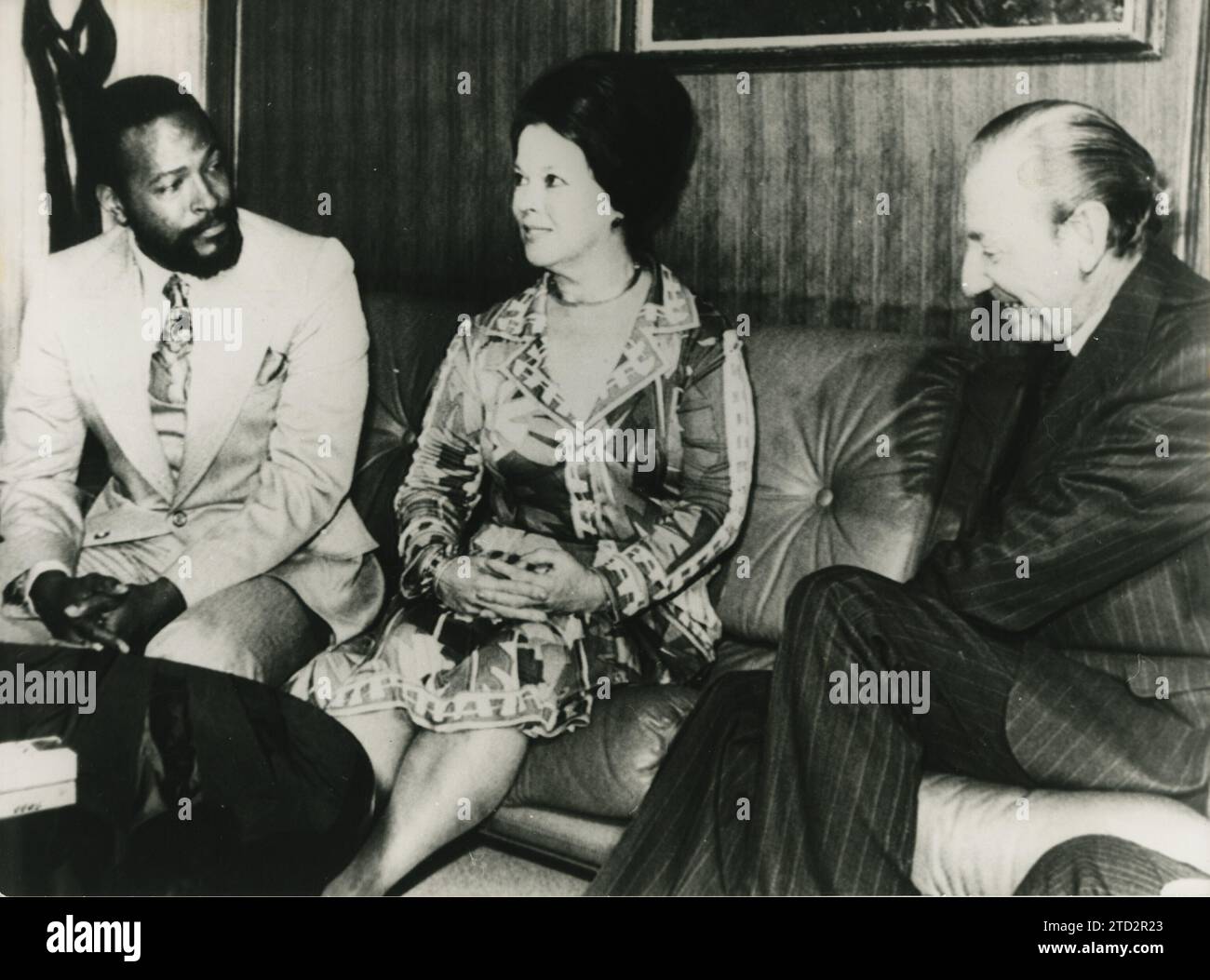 10/13/1975. Shirley Temple, the United States Ambassador to Ghana, and singer Marvin Gaye (left), during a special visit to UN Secretary-General Kurt Waldheim. Gaye has decided to donate an undetermined amount of proceeds from his performances to help the African literacy campaign run by the United States National Committee for UNESCO, which sponsors the project. Credit: Album / Archivo ABC Stock Photo