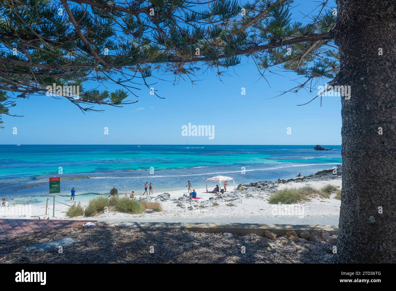Scenic view of the Basin with people sitting on an idyllic white sandy beach and  turquoise water on Rottnest Island or Wadjemup, Western Australia, A Stock Photo