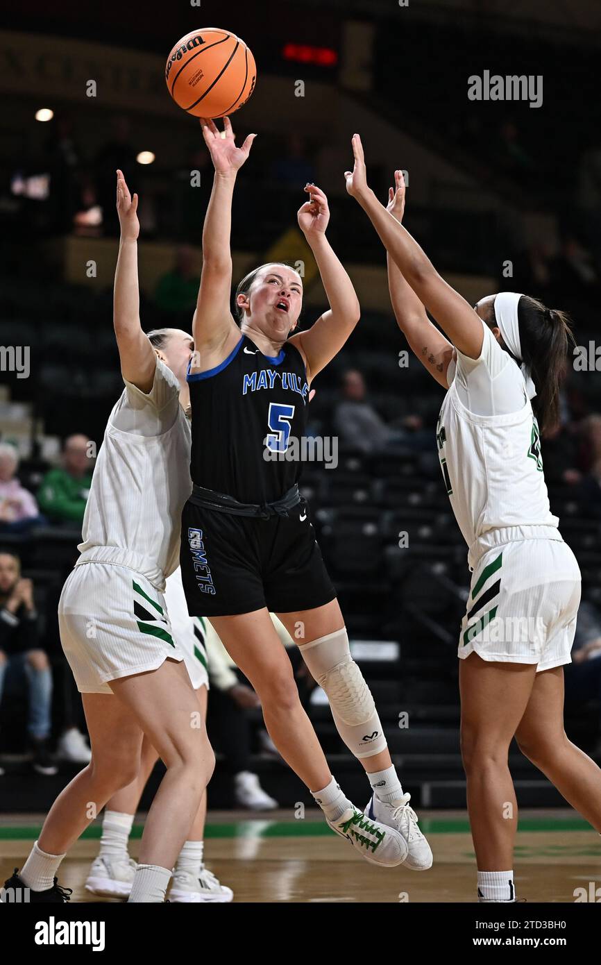Mayville State Comets Guard Mackenzie Hughes (5) goes up for a shot