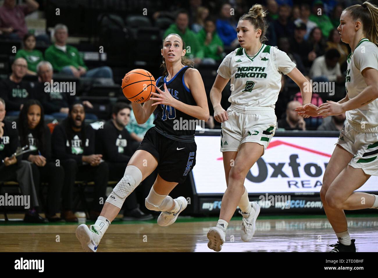 Mayville State Comets Guard Jes Mertens (10) drives to the basket