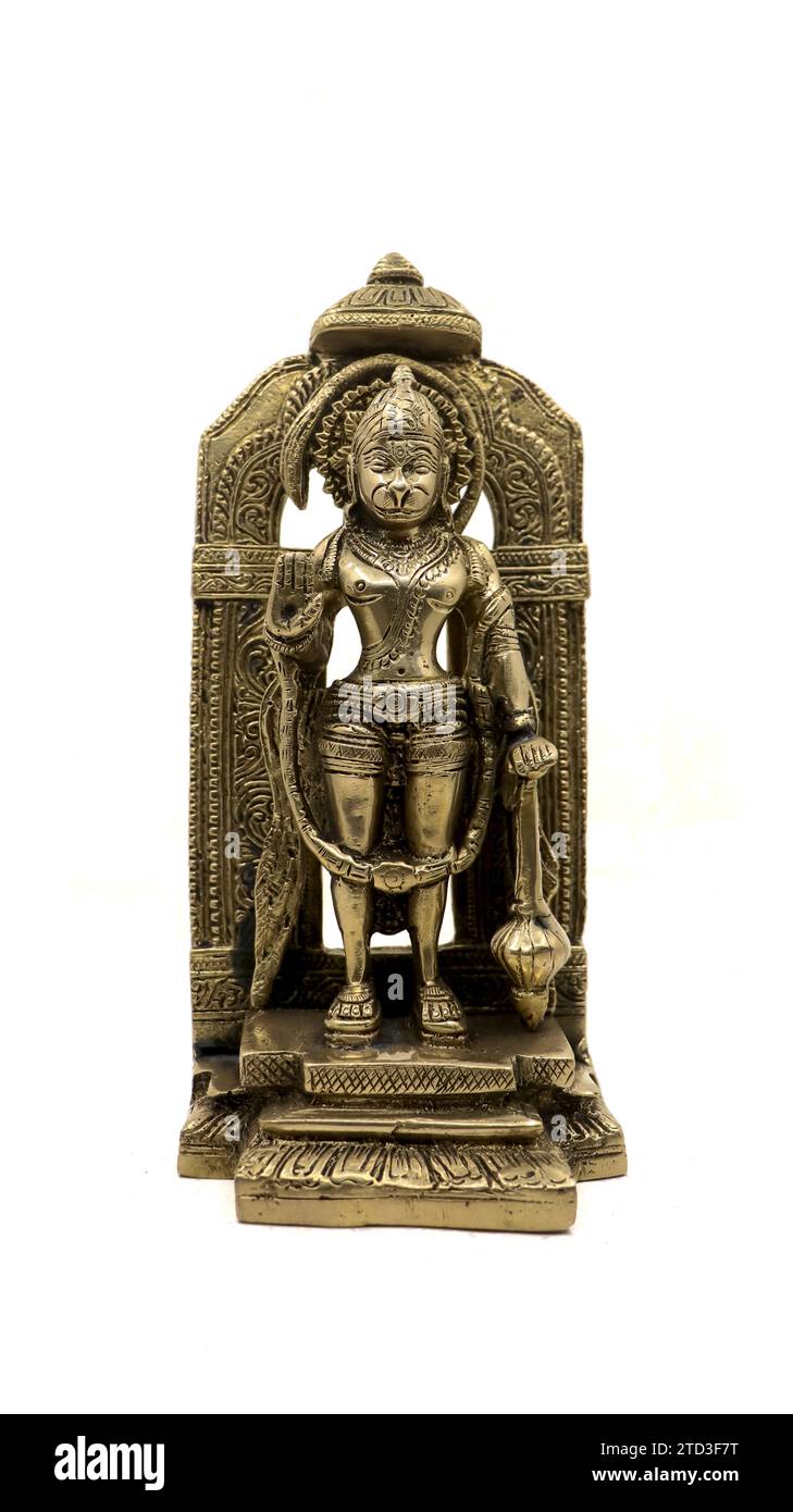 antique golden brass idol of monkey god lord hanuman blessing isolated in a white background Stock Photo