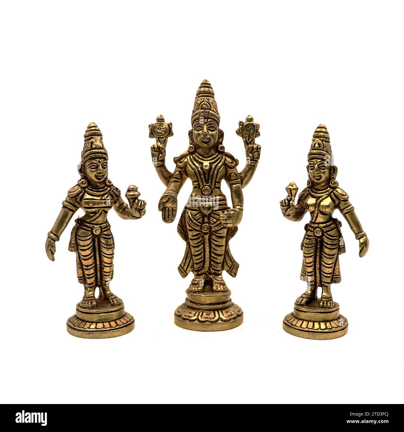 handcrafted antique figure of god vishnu of hindu religion with devi or angels of heaven isolated in a white backgroud Stock Photo