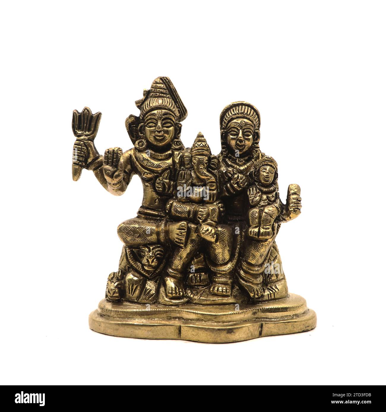 Handcrafted golden brass statue of hindu god of destruction lord shiva family isolated in a white background Stock Photo