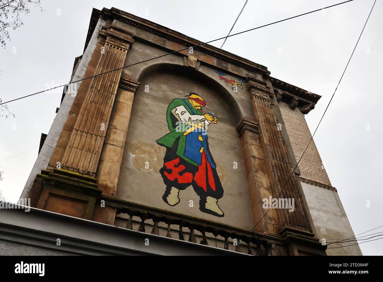 A mural of the Zaporozhian Cossack that operates the FPV (First Person View) combat drone ready to bomb the enemy with a hand grenade is seen on an apartment building wall in the center of Zaporizhzhia. Ukraine's top general Valery Zaluzhny recently identified five areas the country’s armed forces need to work on to regain an edge over the Russian armed forces. Two involve drones: the drones themselves, and the techniques for jamming them. Unmanned vehicles are central to this modern war, big and small, in the air, on land, and in the sea. (Photo by Andriy Andriyenko / SOPA Images/Sipa USA) Stock Photo