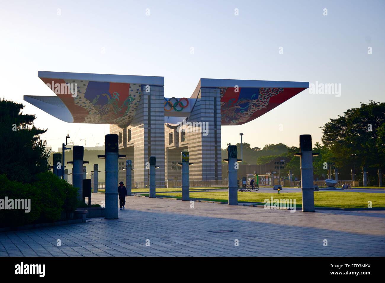 Seoul, South Korea - June 2, 2023: The World Peace Gate in Olympic Park, a stunning architectural monument backlit in early morning, with murals of sp Stock Photo