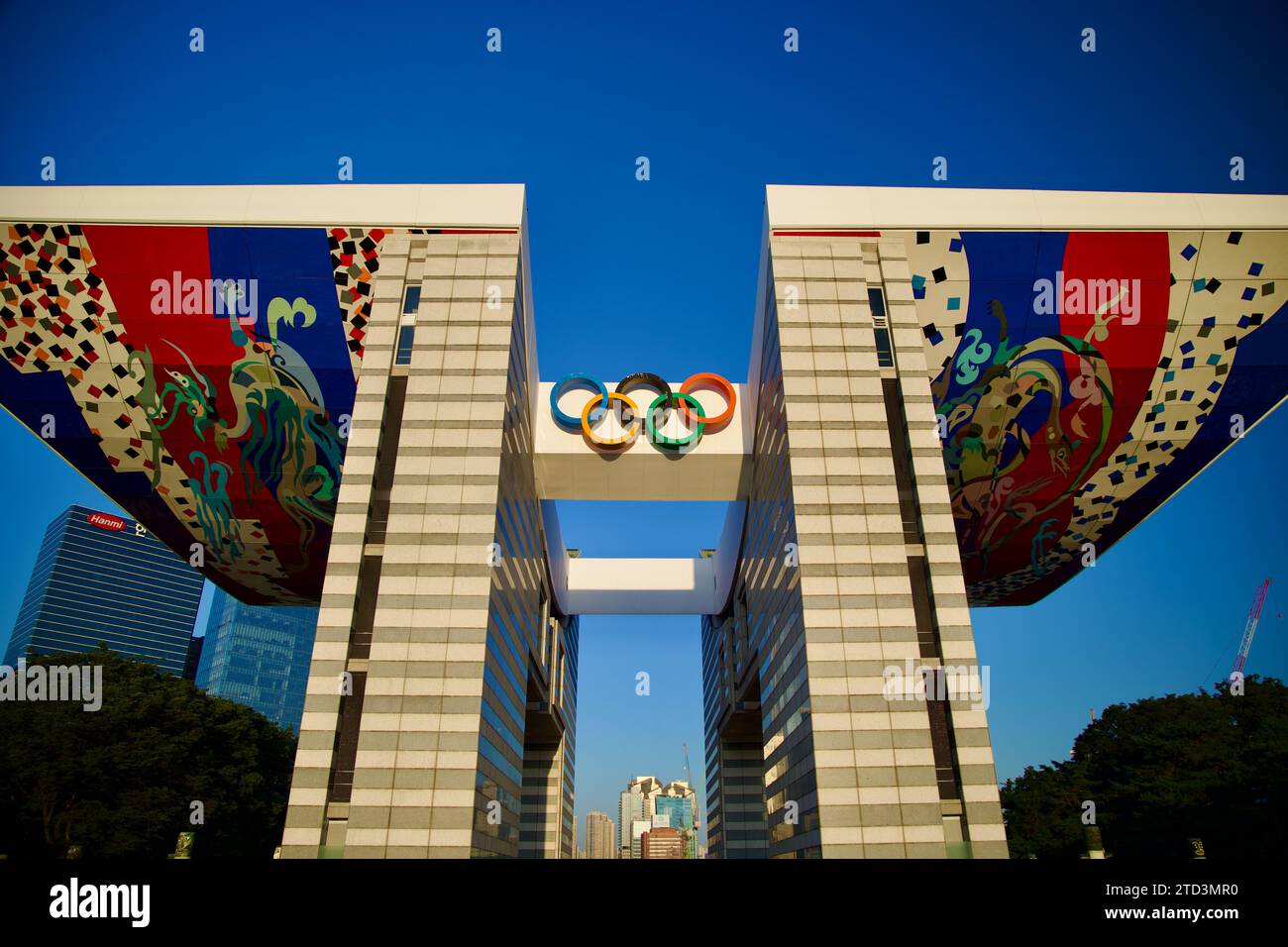 Seoul, South Korea - June 2, 2023: Early morning front view of the World Peace Gate, featuring the Olympic rings and the dragon-adorned underside of t Stock Photo