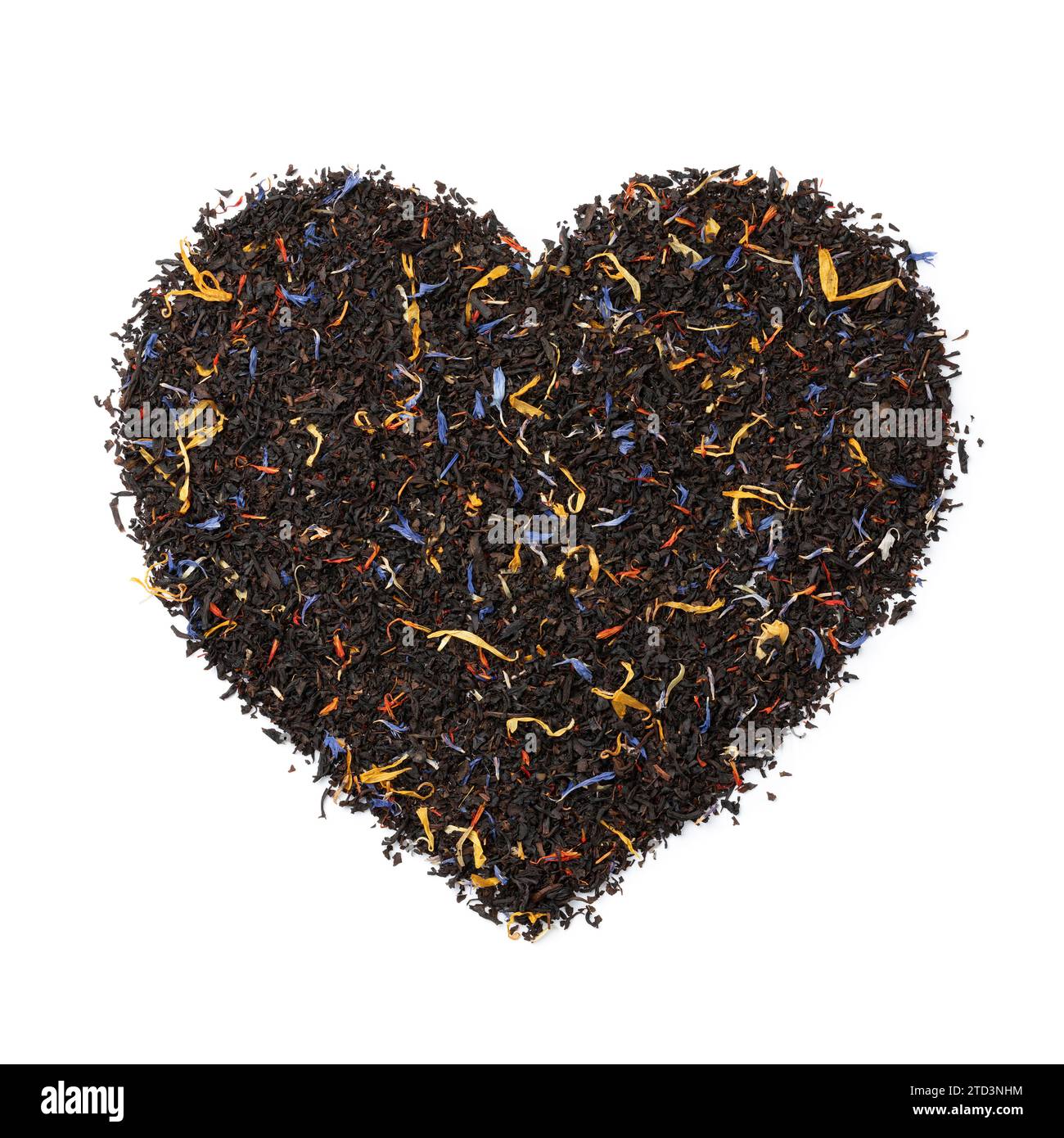 Black tea with dried flower leaves in heart shape isolated on white background Stock Photo