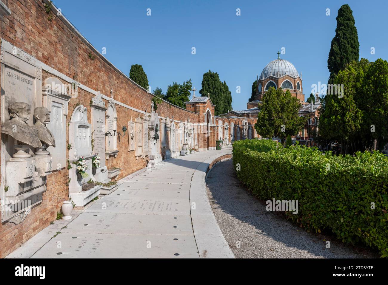 Graves on a wall, behind the dome of St Christopher’s Church, San