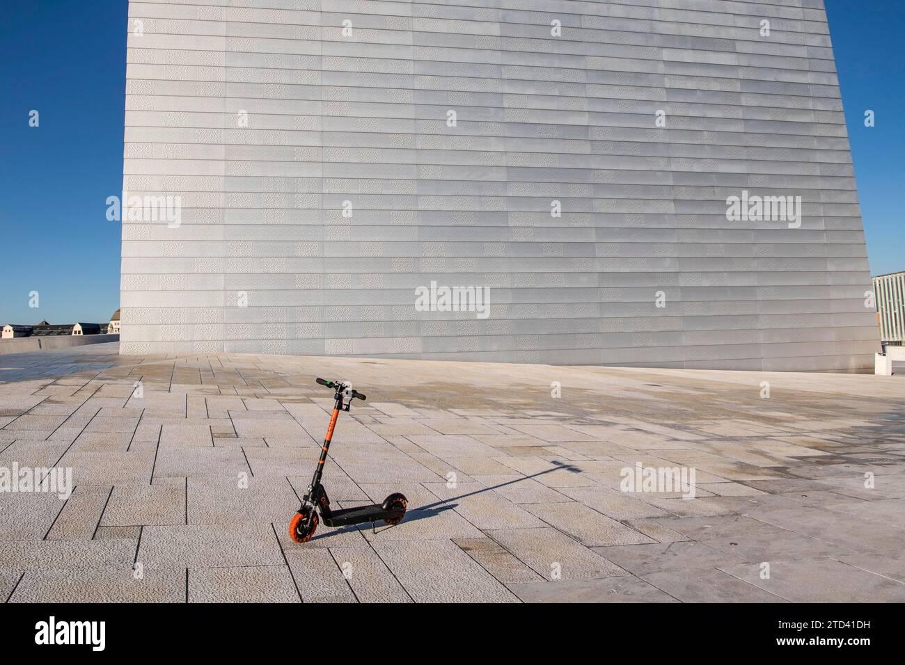 Electric scooter on opera house with walk-on roof, Oslo, Norway Stock Photo
