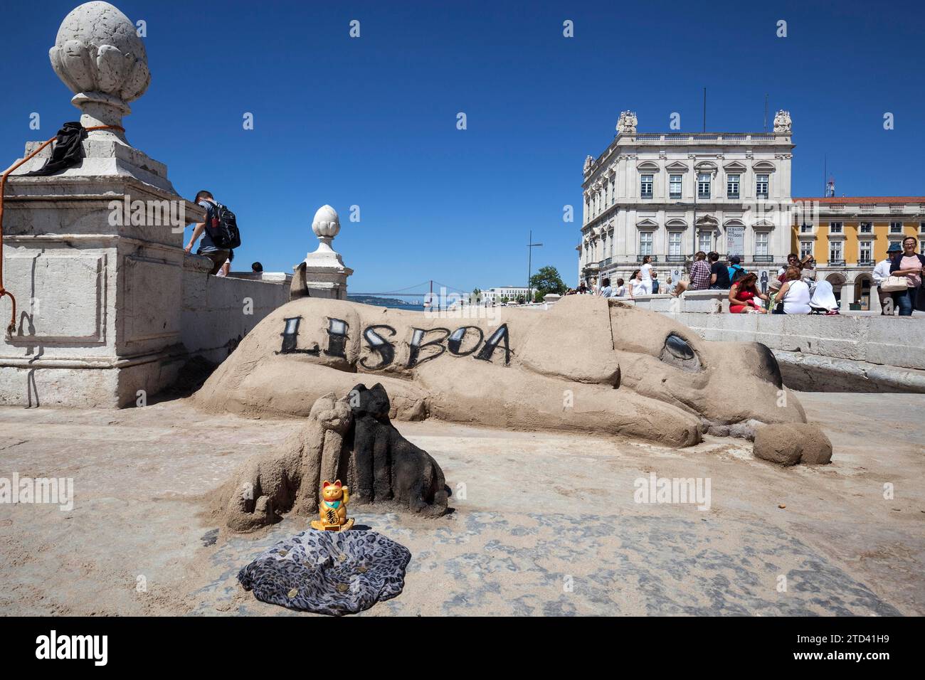 Sand sculpture, lying dog with the lettering Lisboa, Praca do Comercio, Baixa district, Lisbon, Portugal Stock Photo