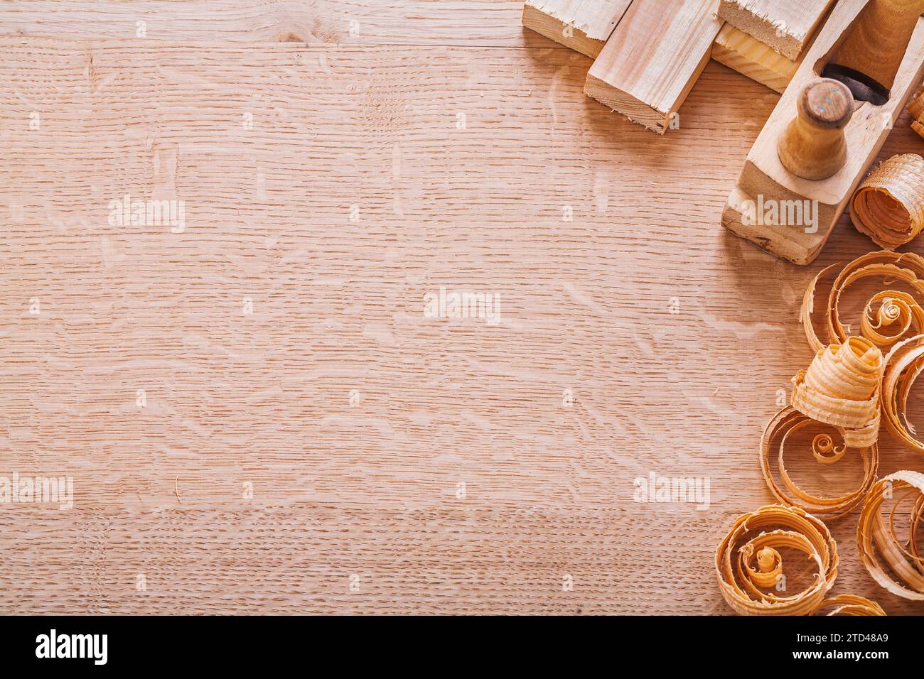 Copyapce image wood shavings old fashioned woodworker planing planks on