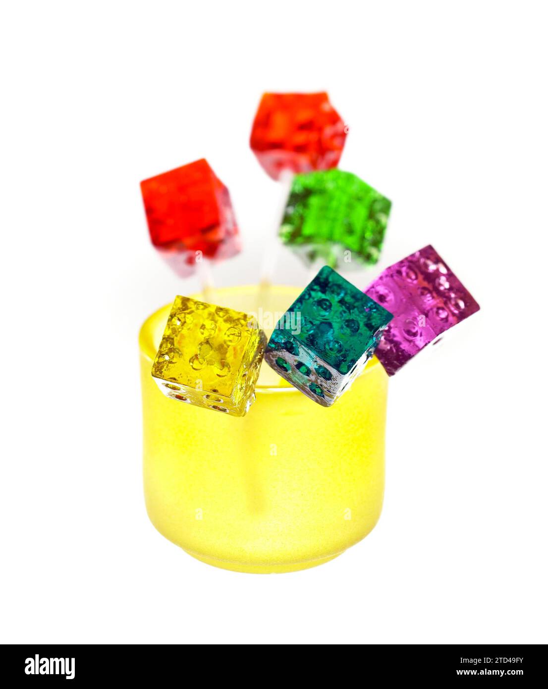 Translucent Lollipops Bounch of colorfull translucent dice shaped lollipops backlit on white ...