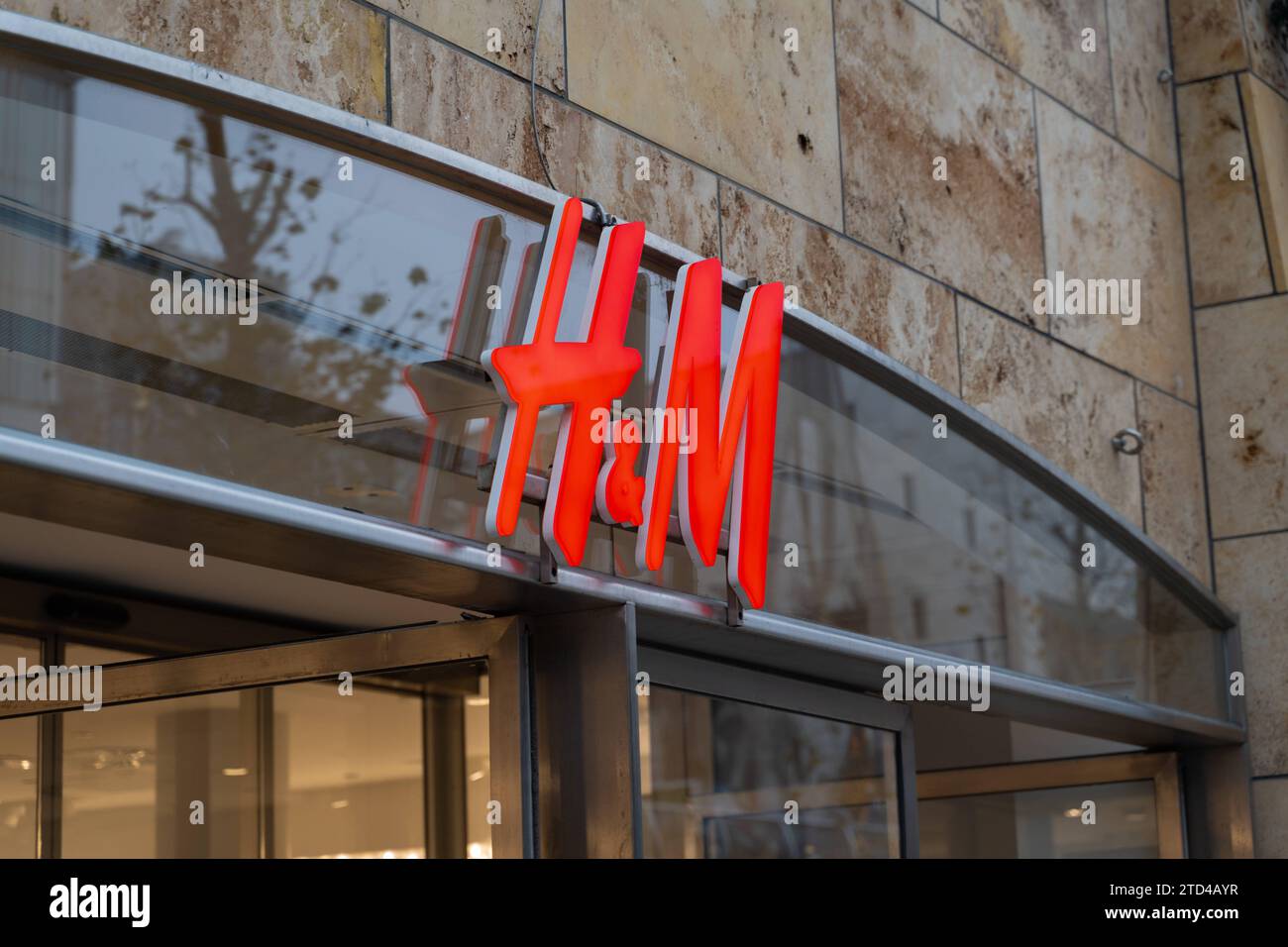 Rotterdam, Netherlands - December 5, 2023: H&M logo on the facade of a clothing store *** H&M Logo an der Fassade von einem Bekleidungsgeschäft Stock Photo