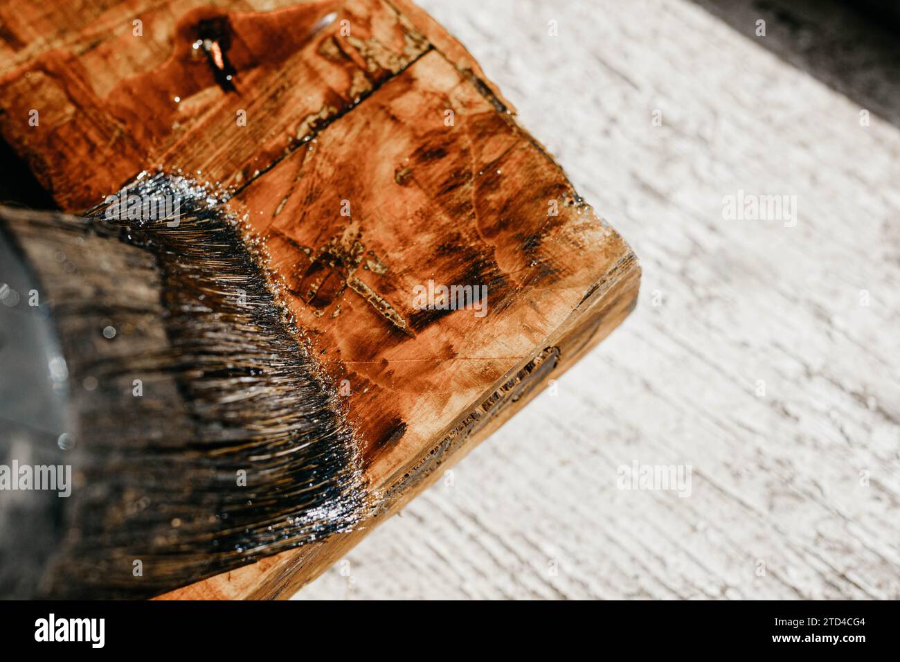 Processing solid wood with varnish and epoxy. furniture restoration Stock Photo Alamy