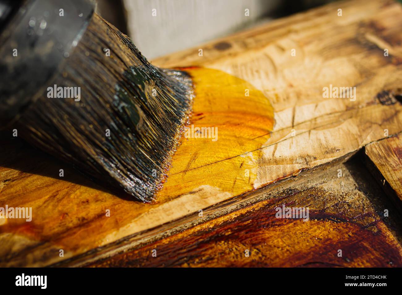 Processing solid wood with varnish and epoxy. furniture restoration