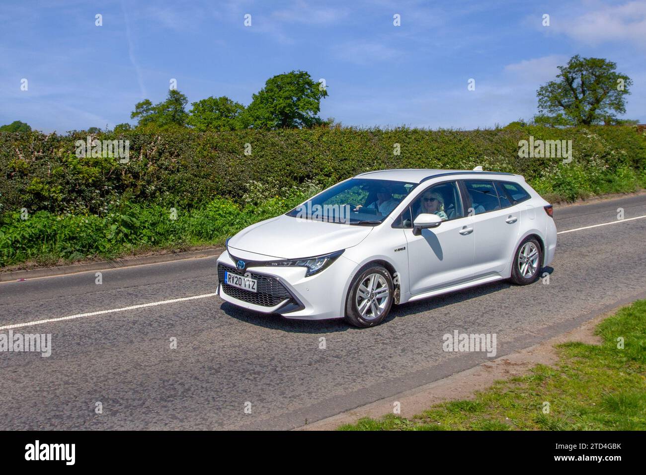 2020 White TOYOTA Corolla Icon Tech HEV CVT Business Edition 1798 cc Hybrid Electric Wagon Auto Express Estate Car of the Year Stock Photo Alamy