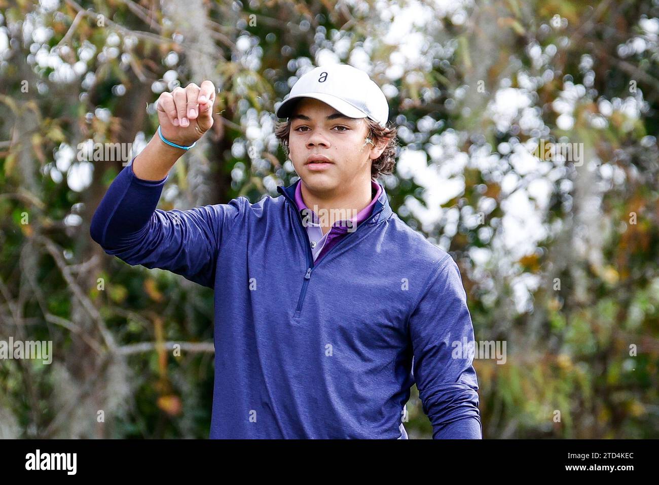 December 15, 2023 Charlie Woods testing the wind by throwing some