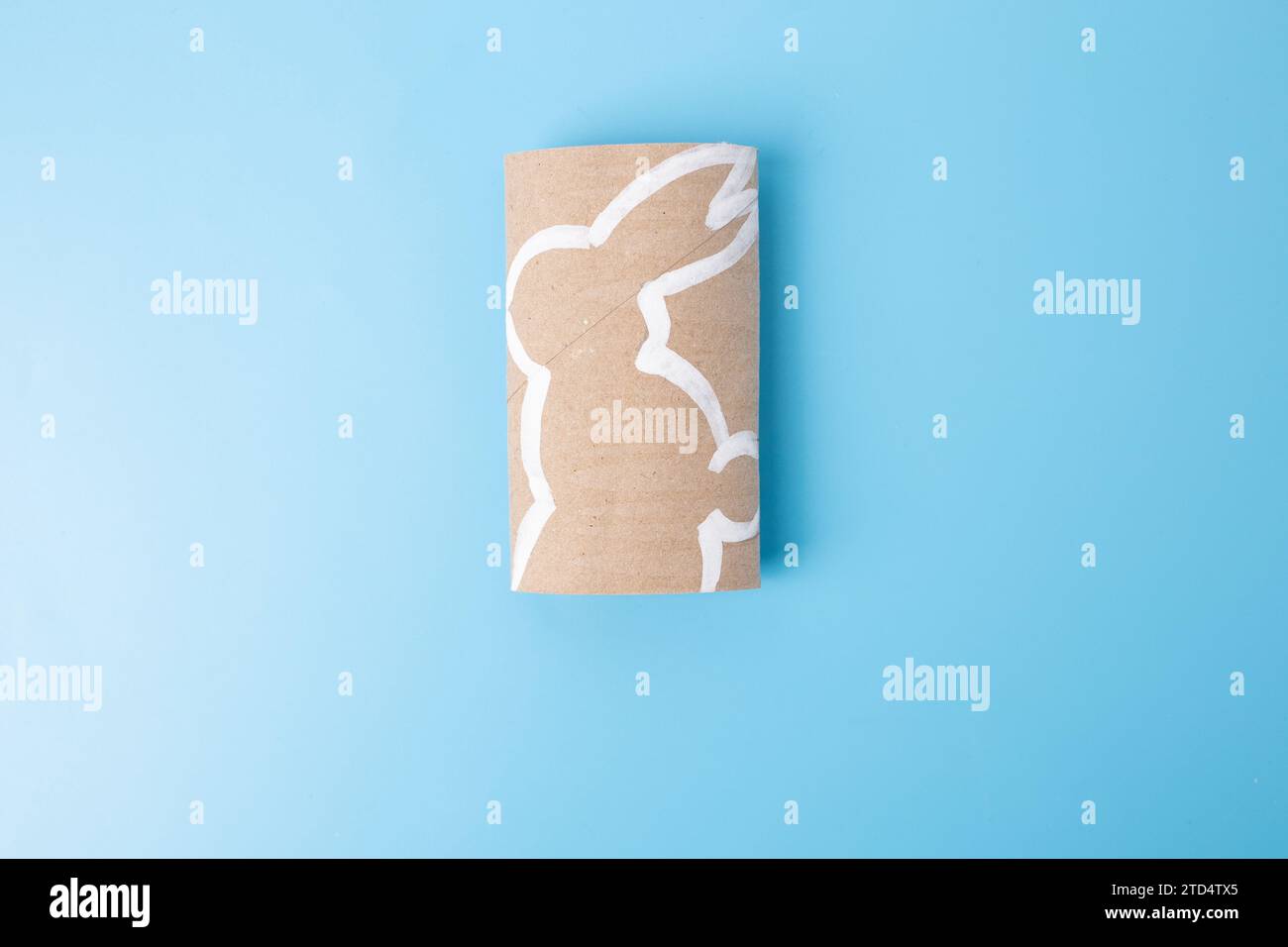 Making Cut Out Rabbits cut out paper rabbit animal tutorial, craft, DIY Stock Photo - Alamy
