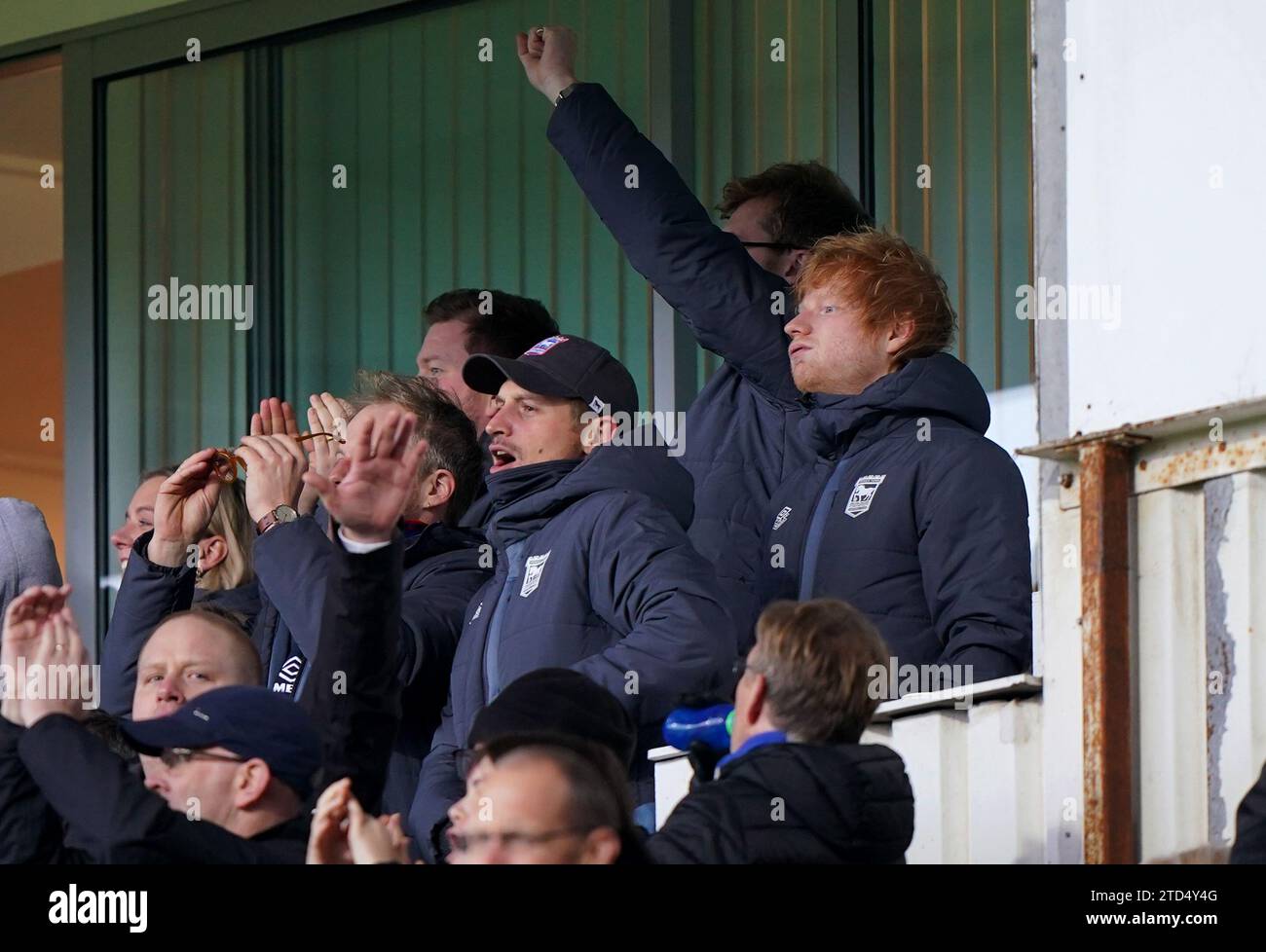 Ipswich Town fan Ed Sheeran (right) reacts after their side's second goal during the Sky Bet Championship match at Portman Road, Ipswich. Picture date: Saturday December 16, 2023. Stock Photo