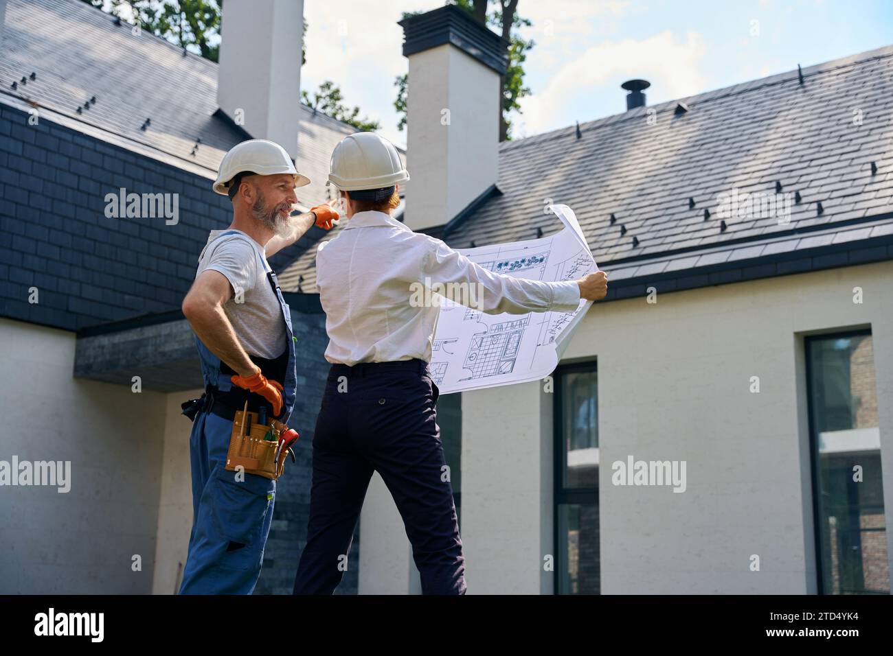 Construction site manager demonstrating hi-res stock photography and ...