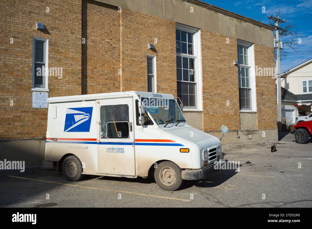A Grumman US Postal Service mail truck parked at the Caro Michigan post