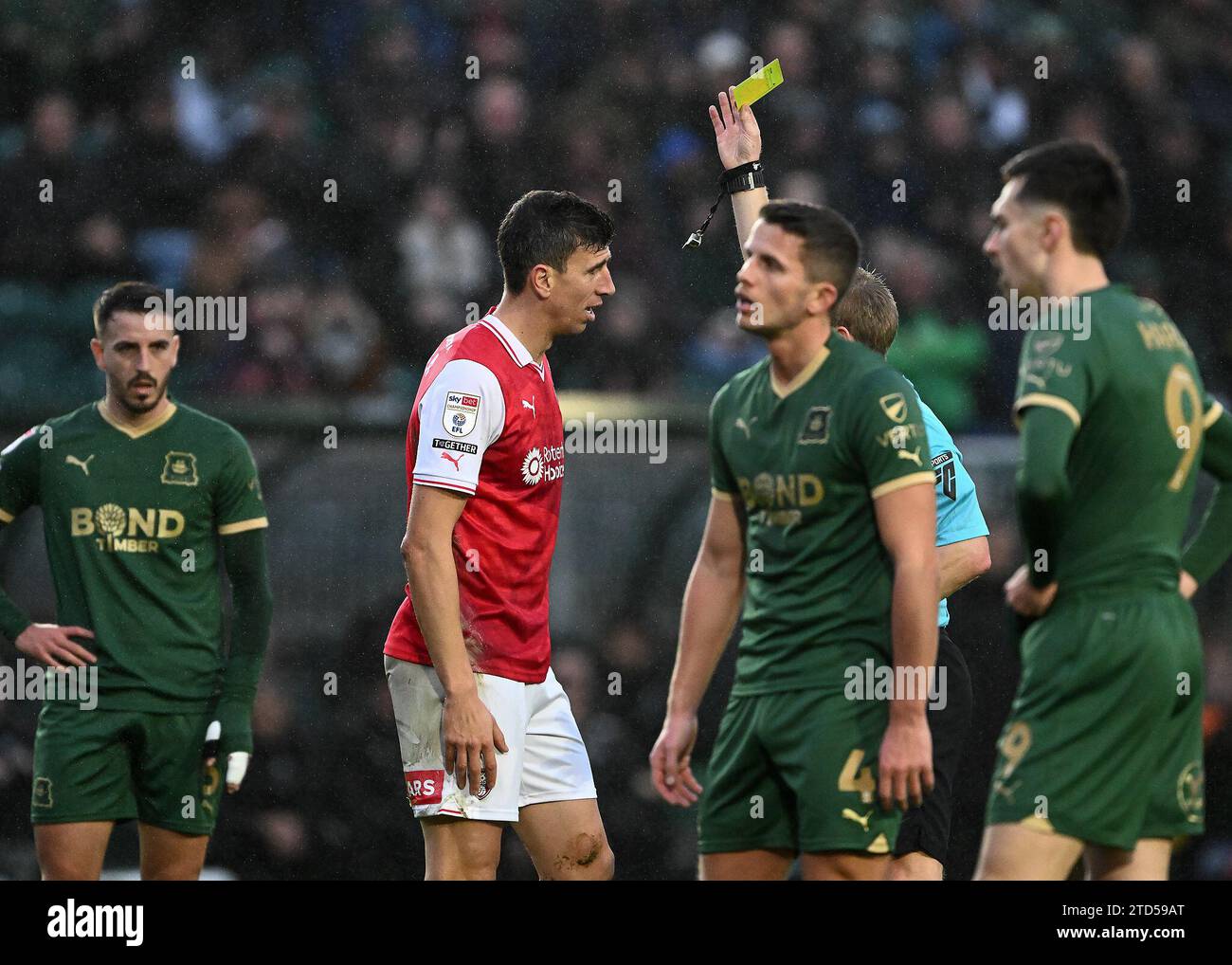 Daniel Ayala #4 of Rotherham United receives a yellow card during the ...