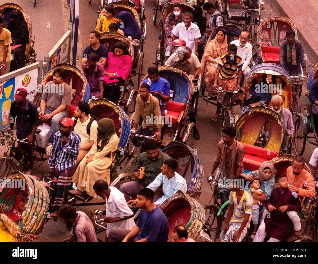 Dhaka, Bangladesh-December,5,2023: Overcrowded completely with rickshaws,cycle rickshaw traffic jam in a busy street in Dhaka.Asiaimage Stock Photo