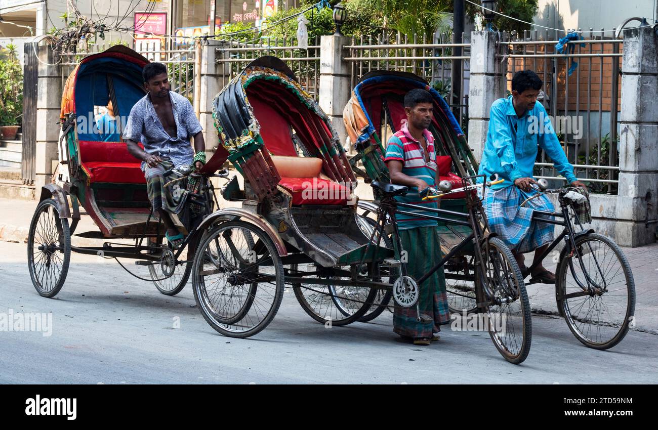Dhaka,Bangladesh  October,17,2022Daily life of a Rickshaw Puller in Dhaka City of Bangladesh,South Asia Stock Photo
