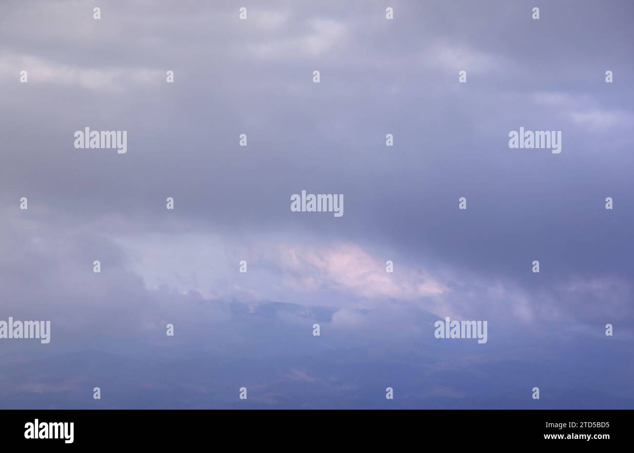Beautiful cloud formations in the sky with sunlight behind. White ...