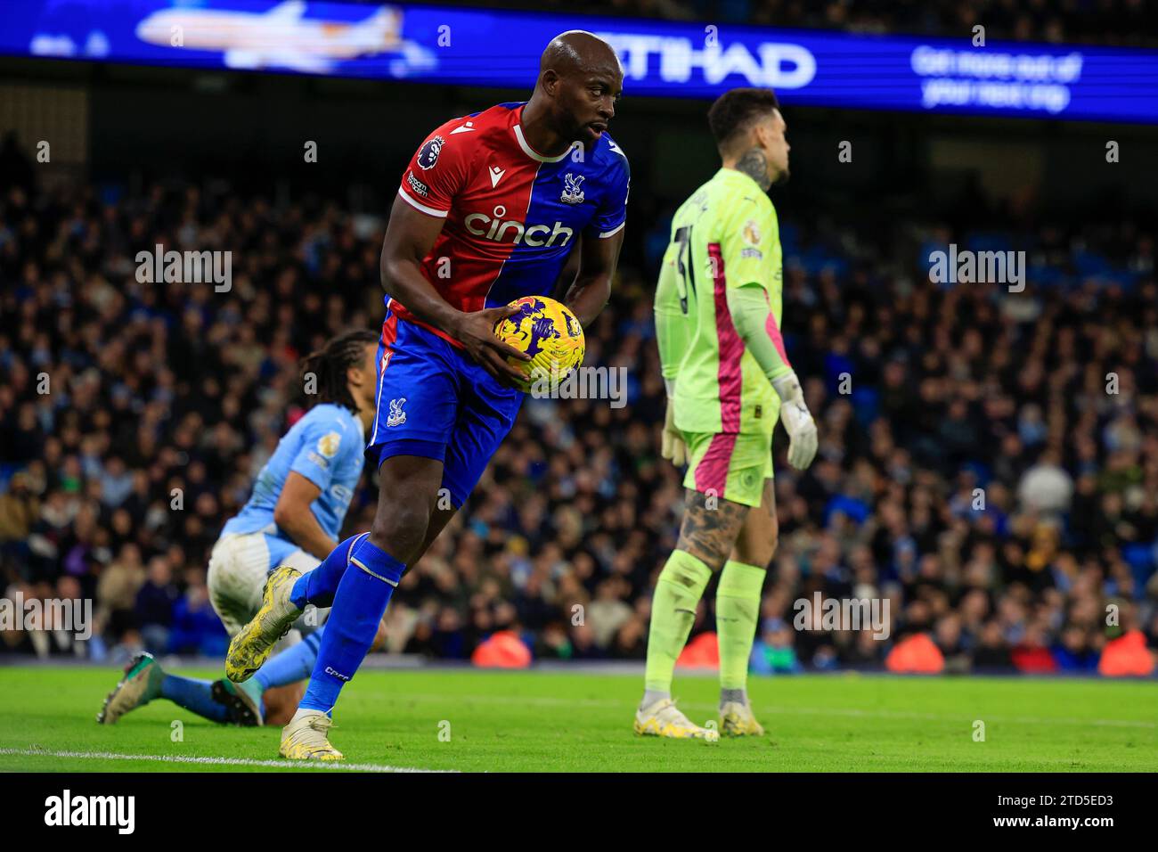 Jean-Philippe Mateta #14 of Crystal Palace tries to get on with the game  after scoring to make it 2-1 during the Premier League match Manchester  City vs Crystal Palace at Etihad Stadium,